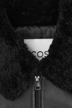 COS SHEARLING-TRIMMED LEATHER BOMBER JACKET- Coats & Jackets